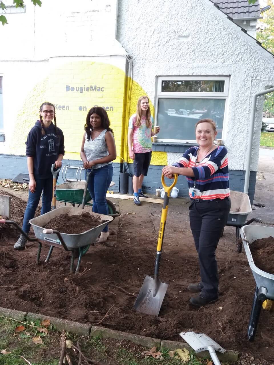 Students on volunteer gardening project